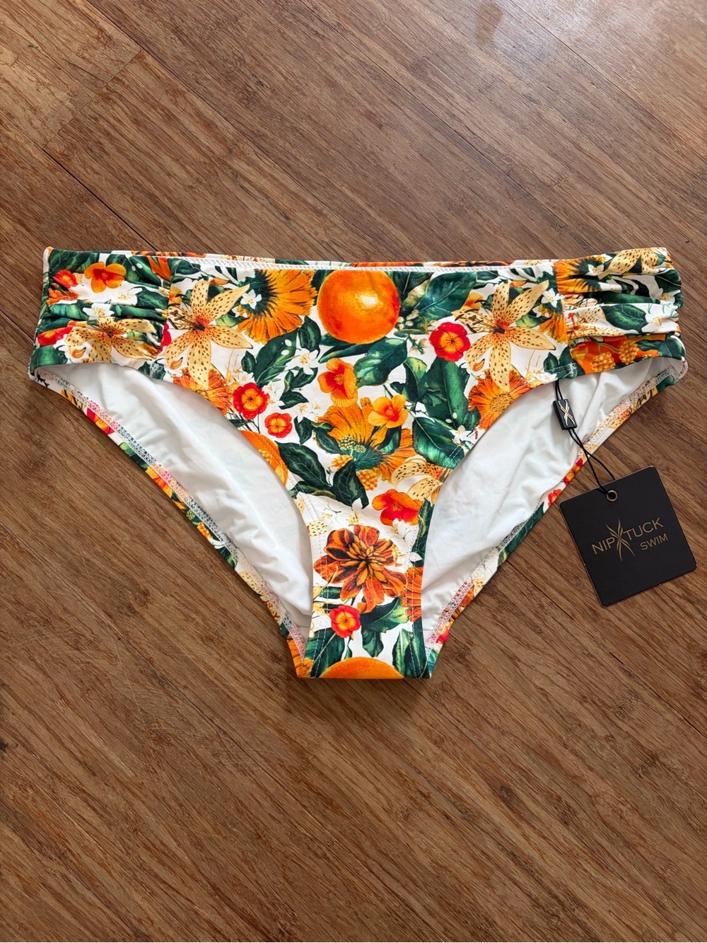 NWT NipTuck Swim Tropical Orange Floral Bikini Bottoms, Sz 10